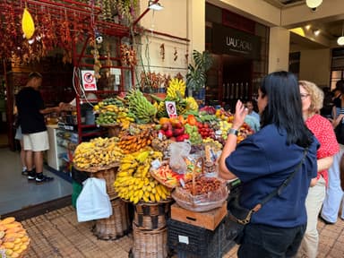 A vibrant market stall filled with various fruits and vegetables.